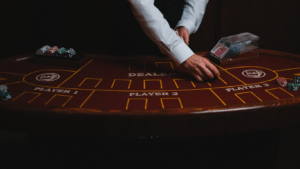 a person playing blackjack on a casino table