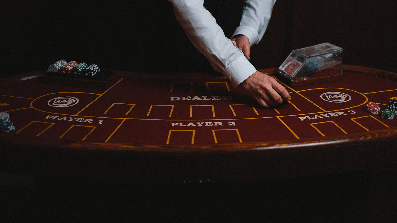 a person playing blackjack on a casino table