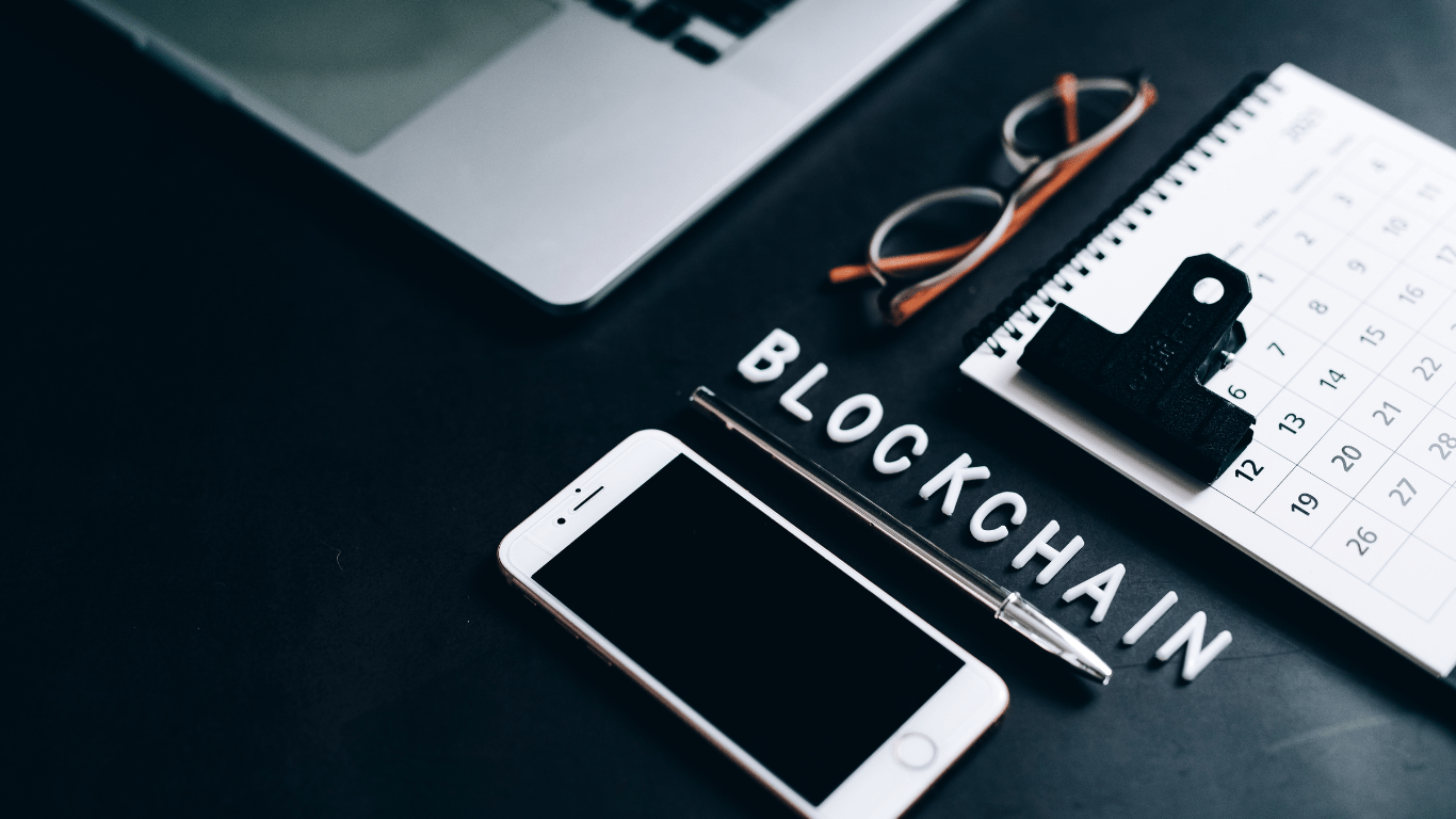 image of cellphone with blockchain word